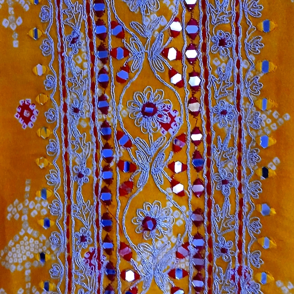 Dubai Intex Churidar Orange Kurti with White and Red Accents